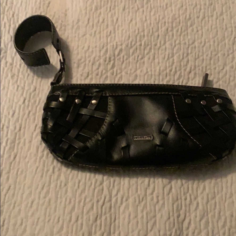 Calvin Klein clutch with wrist attachment